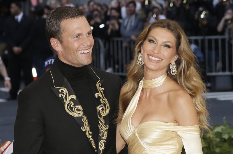Tom Brady (L) and Gisele Bündchen have both retained lawyers amid their alleged marriage troubles. File Photo by John Angelillo/UPI