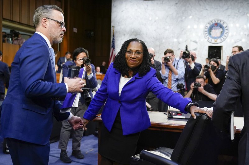 Supreme Court nominee Ketanji Brown Jackson departs with her husband Dr. Patrick Jackson (L) after the first day of her Senate Judiciary Committee confirmation hearing in Washington D.C., on Monday. Pool photo by J Scott Applewhite/UPI | <a href="/News_Photos/lp/04b0615811a528265968794840f0281c/" target="_blank">License Photo</a>