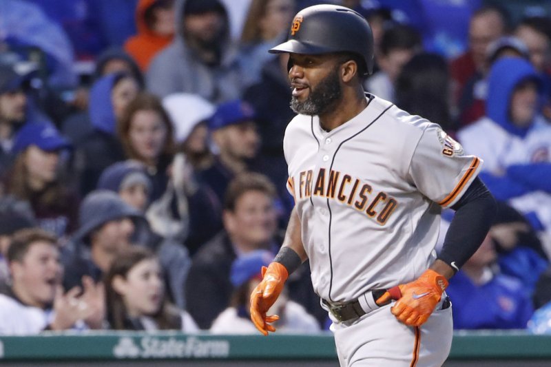Former San Francisco Giants outfielder Denard Span smiles after hitting a solo home run off Chicago Cubs starting pitcher Kyle Hendricks in the third inning on May 24 at Wrigley Field in Chicago. Photo by Kamil Krzaczynski/UPI | <a href="/News_Photos/lp/1b70fdd7f74d07f91f616afecb3f296d/" target="_blank">License Photo</a>