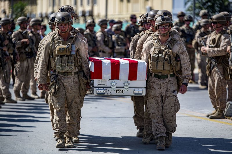 U.S. service members assigned to Special Purpose Marine Air-Ground Task Force-Crisis Response-Central Command are pallbearers for the service members killed in action during operations at Hamid Karzai International Airport in Kabul, Afghanistan on August 27, 2021. File Photo by 1s Lt. Mark Andries/USMC/UPI