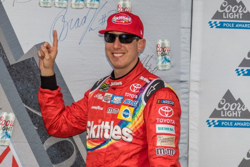 Kyle Busch celebrates after winning the pole for the 2017 Brickyard 400 in July. Photo by Edwin Locke/UPI | <a href="/News_Photos/lp/aa955b6c398686378aae7878eaf8e203/" target="_blank">License Photo</a>