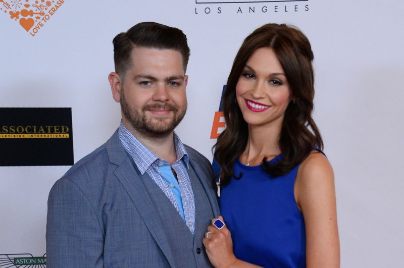 Jack Osbourne (L) and wife Lisa Osbourne at the Race to Erase MS gala on May 2, 2014. The couple said they are 'really lucky' to have new daughter Andy. File photo by Jim Ruymen/UPI