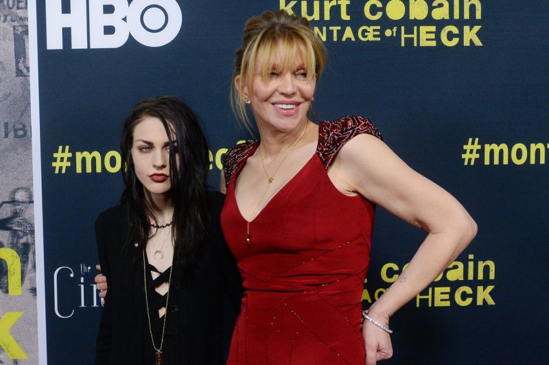 Frances Bean Cobain (L), pictured with Courtney Love, reached a settlement in her divorce Monday. File Photo by Jim Ruymen/UPI | <a href="/News_Photos/lp/8a55cf90fada2bd0705a57ff945cf7fa/" target="_blank">License Photo</a>
