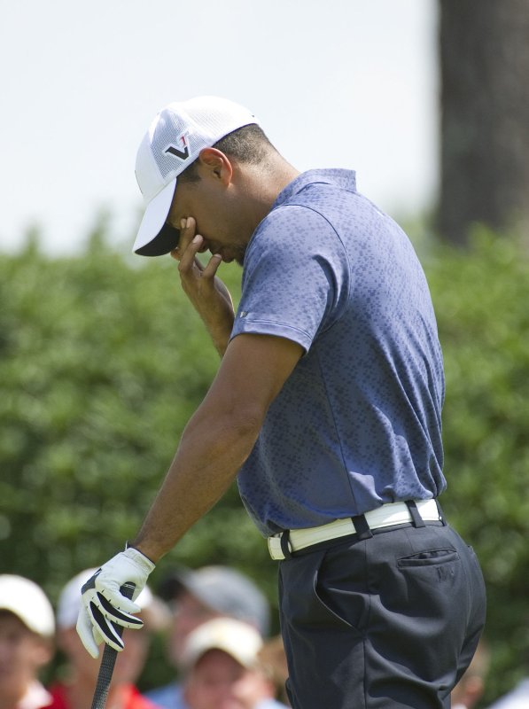 Tiger Woods rubs his eyes on the 7th tee during the second round of the 93rd PGA Championship at the Atlanta Athletic Club, Aug. 12, 2011 in Johns Creek, Ga. UPI/Brian Kersey | <a href="/News_Photos/lp/17b310f178dd02b864c9da395c802e89/" target="_blank">License Photo</a>