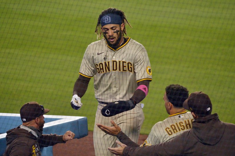 San Diego Padres shortstop Fernando Tatis Jr. (C), shown April 22, 2021, missed the team's past eight games after testing positive for COVID-19 last week. File Photo by Jim Ruymen/UPI