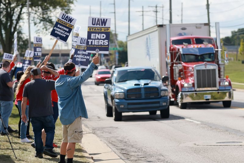 United Auto Workers strike Monday outside the Stellantis factory, in Toledo, Ohio. Nearly 13,000 workers walked off the job Friday at GM’s midsize truck and commercial van plant in Wentzville, Mo., Stellantis NV’s Jeep Wrangler and Gladiator plant in Toledo, Ohio, and the Ford’s Ranger and Bronco plant in Wayne, Mich., over pay and benefits. Photo by Aaron Josefczyk/UPI