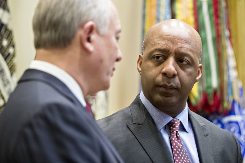JCPenney's CEO Marvin Ellison (R) caused the department stores' shares to plunge after resigning Tuesday to take over as president and CEO of Lowe's. File photo by Andrew Harrer/UPI