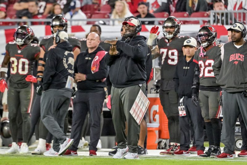 Tampa Bay Buccaneers head coach Todd Bowles (C) fired six assistant coaches this week. File Photo by Steve Nesius/UPI