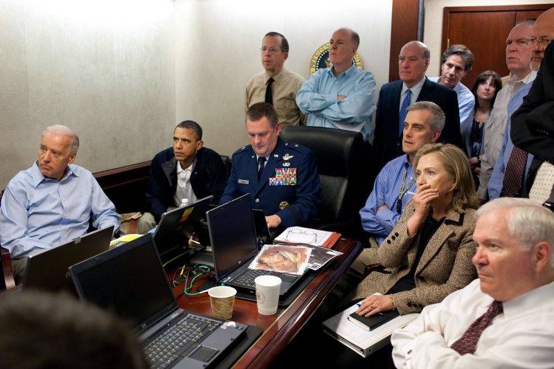 U.S. President Barack Obama and Vice President Joe Biden, along with with members of the national security team, receive an update on the mission against Osama bin Laden in the Situation Room of the White House, May 1, 2011. Please note: a classified document seen in this photograph has been obscured. UPI/Pete Souza/White House