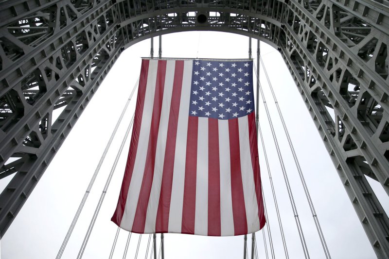 A large American flag hangs on the George Washington Bridge on President's Day in New York City on February 19. File Photo by John Angelillo/UPI