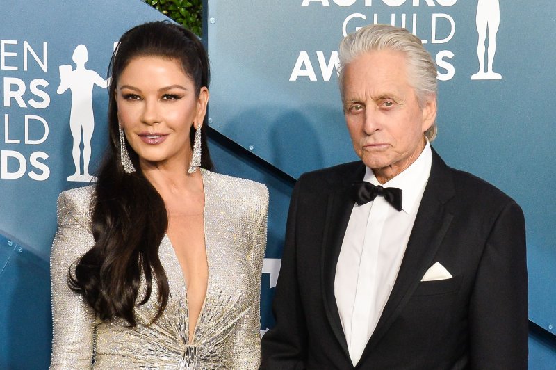 Catherine Zeta-Jones (L), pictured with Michael Douglas, shared a throwback video of her daughter, Carys, and compared her to a real-life Wednesday Addams. File Photo by Jim Ruymen/UPI
