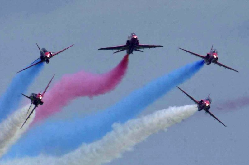 An independent regulator on Monday stripped about $1.8 million from a U.K. Ministry of Defense contract with Rolls-Royce for engines that power Hawk aircraft, like those used by the British Royal Air Force's Red Arrows demonstration team, shown here in 2003. File photo by AFIE/Val Gempis/UPI | <a href="/News_Photos/lp/4fe5153fb008785d7dbf4159647a47e3/" target="_blank">License Photo</a>