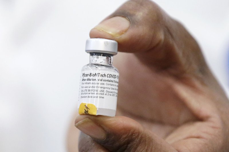 The pharma company said the child vaccine dose, which is given three weeks apart, showed during clinical trials that it was just as effective as the full dose was for adults.&nbsp;File Photo by John Angelillo/UPI