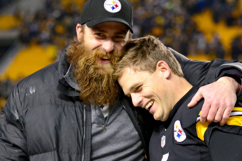 Pittsburgh Steelers kicker Shaun Suisham (6) celebrates the 27-17 win over the Cincinnati Bengals with Pittsburgh Steelers defensive end Brett Keisel (99) at Heinz Field in Pittsburgh on December 28, 2014. UPI/Archie Carpenter