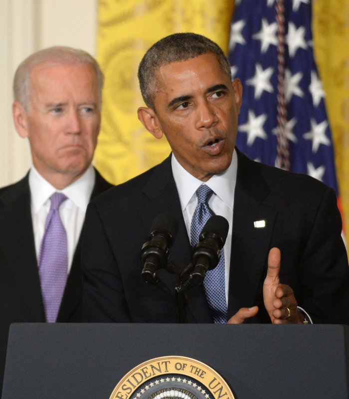 U.S. Vice President Joe Biden listens as President Barack Obama makes a point during his remarks at an event to launch the 'It's On Us' campaign geared to preventing sexual assault on college campuses, in the East Room of the White House in Washington, DC on September 19, 2014. The administration has enlisted the help of major college sports leagues, athletes and celebrities in the public awareness campaign. UPI/Pat Benic