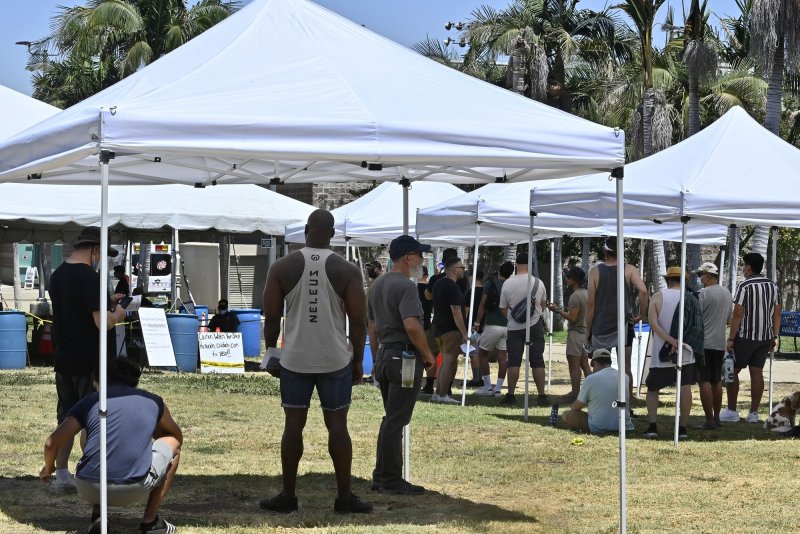A line forms at a monkeypox vaccination clinic at Balboa Park in Encino, Calif., on August 6. Photo by Jim Ruymen/UPI | <a href="/News_Photos/lp/23176d544da423328b7b8c3193e99900/" target="_blank">License Photo</a>