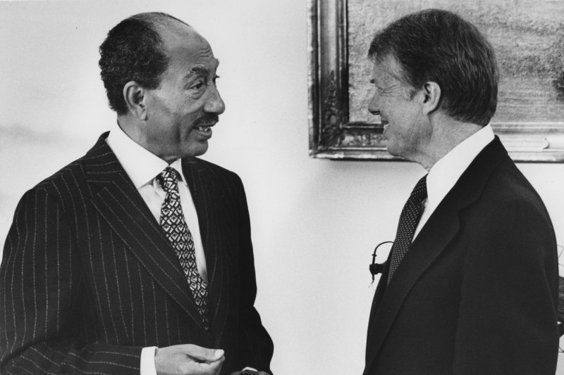 Egyptian President Anwar Sadat and U.S. President Jimmy Carter speak in the Oval Office of the White House prior to a peace treaty signing on March 26, 1979. UPI Photo/File | <a href="/News_Photos/lp/2db54d346c161b93fb929da227d7f3e9/" target="_blank">License Photo</a>
