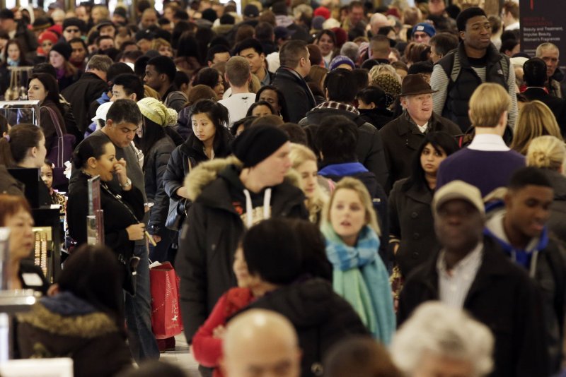 Shoppers walk through Macy's in Herald Square on Black Friday in New York City on November 29, 2013. (File/UPI/John Angelillo)