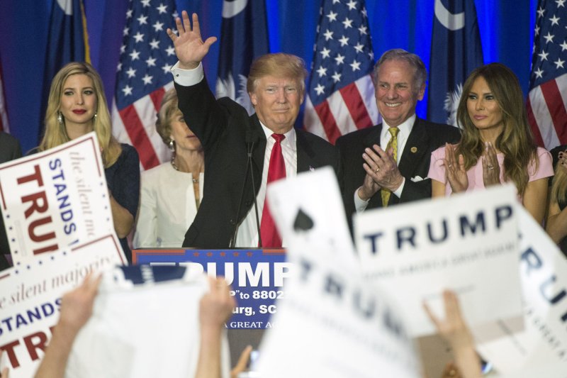 Republican presidential hopeful Donald Trump delivers remarks to supporters after winning the South Carolina Republican primary Saturday in Spartanburg, S.C. Trump was joined by his daughter Ivanka (L), his wife Melania (R), South Carolina Lt. Gov. Henry McMaster and McMaster's wife Peggy. Photo by Kevin Dietsch/UPI