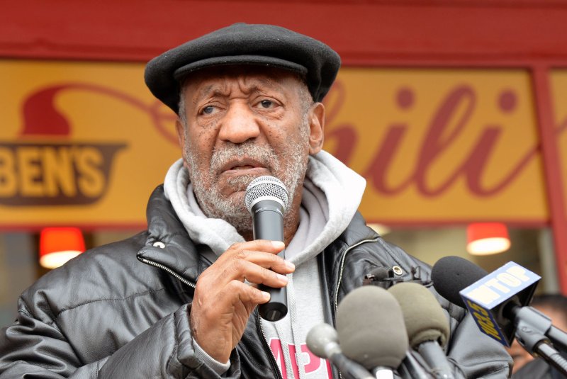 Bill Cosby delivers remarks at the opening of Ben's Chili Bowl's second location on March 6, 2014, in Arlington, Virginia. Cosby has been ordered to answer questions under oath regarding an alleged sexual assault against Judy Huth. Photo by Kevin Dietsch/UPI
