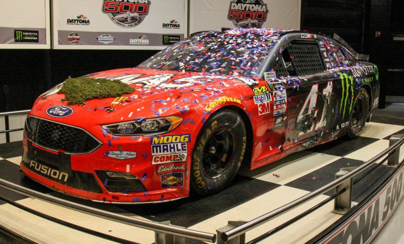 Kurt Busch's winning car from the 2017 Daytona 500, on display complete with sod from the tri-oval. Photo by Mike Gentry/UPI