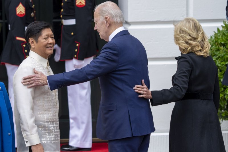 President Joe Biden greets Philippines President Ferdinand Marcos Jr. at the South Portico of the White House on Monday. The two leaders met to reaffirm U.S. defense commitments in Southeast Asia and discuss ways to shore up their expanding military alliance. Photo by Ken Cedeno/UPI