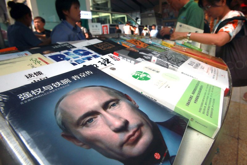 An English-language book about the rise of Russian President Vladimir Putin, translated into Chinese, is sold at a news kiosk in Beijing. Russia's relationship with China stands to gain on multiple fronts, including energy, trade and banking, as U.S. and European governments increase sanctions on Russia due to Putin's push into Ukraine. UPI/Stephen Shaver