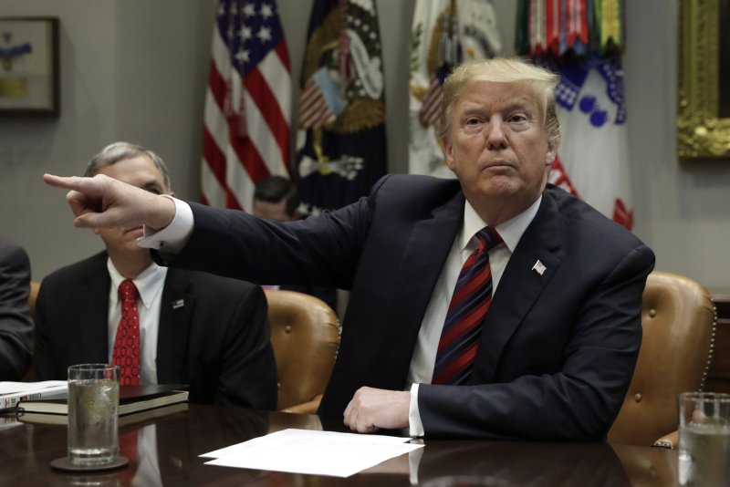 President Donald Trump gestures during a briefing on drug trafficking on the southern border at the White House on Wednesday. Trump announced the grounding of Boeing's 737 Max 8 and Max 9 aircraft at the briefing. Photo by Yuri Gripas/UPI | <a href="/News_Photos/lp/e671171a0270a62640e46da32ee12ef9/" target="_blank">License Photo</a>