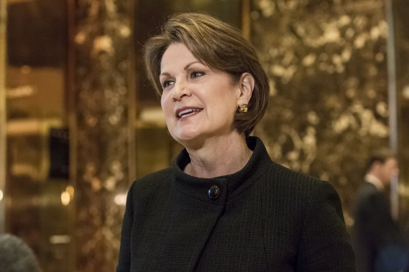 Lockheed Martin CEO Marillyn Hewson says the company is finalizing a new contract to lower the price for the next 90 F-35 aircraft. Pictured: Hewson speaks to the press in the lobby of Trump Tower in New York City on January 13, 2017. Pool photo by Albin Lohr-Jones/UPI