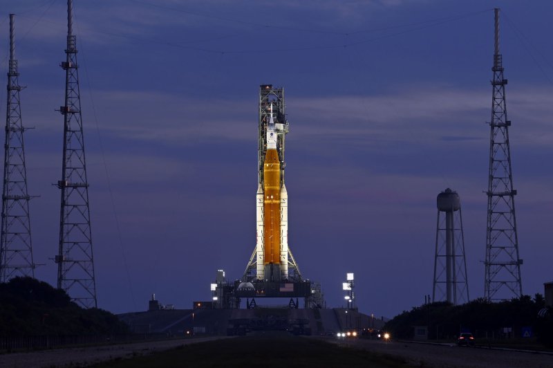 NASA's SLS rocket and Orion spacecraft stand on Complex 39B at the Kennedy Space Center in Florida at dawn on Friday. The launch is set for Monday. Photo by Joe Marino/UPI