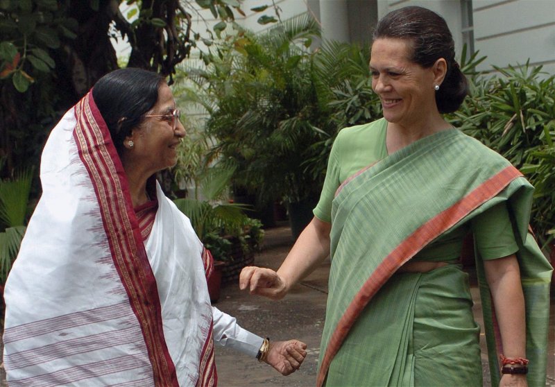 Congress party President and Chairman of India's ruling United Progressive Alliance Sonia Gandhi (R) welcomes Indian president nominee Pratibha Patil, 72, at her residence in New Delhi on June 16, 2007. She retired from her post as the leader of India's main opposition Congress party. File Photo by Kamal Kishore/UPI Photo