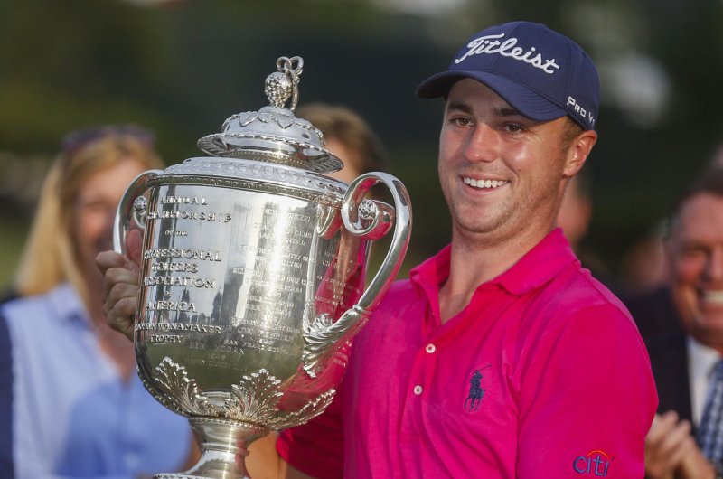 Justin Thomas holds the Wanamaker Trophy after winning the 2017 PGA Championship at the Quail Hollow Club in Charlotte, North Carolina on August 13, 2017. File photo by Nell Redmond/UPI