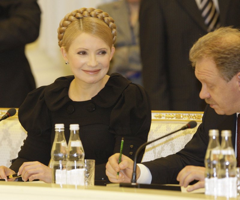 Ukrainian Prime Minister Yulia Tymoshenko (L) and Oleg Dubina, the head of Ukrainian gas company Naftogaz, attend an international meeting on the European gas crisis in Moscow on January 17, 2009. (UPI Photo/Anatoli Zhdanov) | <a href="/News_Photos/lp/30055fd52ccc7e18ce919f3e401254f3/" target="_blank">License Photo</a>