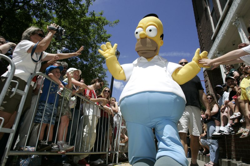 Homer Simpson walks down the yellow carpet at the hometown premiere of "The Simpsons Movie" at the Springfield Movie Theater in Springfield, Vermont on July 21, 2007.(UPI Photo/Matthew Healey)