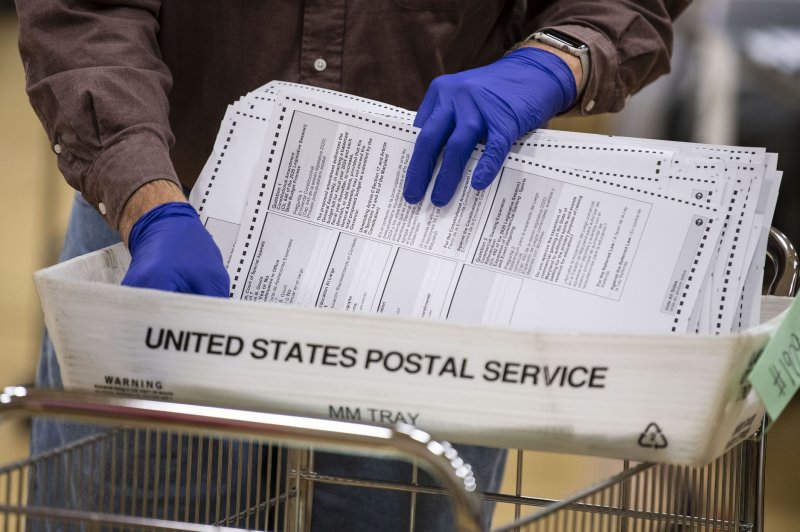 Nevada Gov. Steve Sisolak signed a measure requiring all county and city clerks to send every active registered voter in the state a mail-in ballot before a primary or general election. File Photo by Kevin Dietsch/UPI