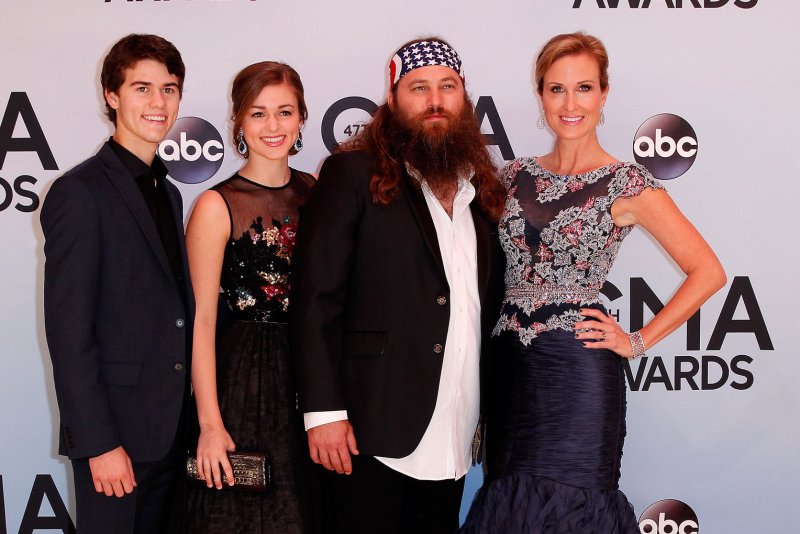 Members of the reality television show Duck Dynasty, including Willie Robertson (2nd-R) and his wife Korie (R) and their children John Luke and Sadie. UPI/Terry Wyatt | <a href="/News_Photos/lp/9c9e3badf55f4cafa6f9d6d47c0b8fd0/" target="_blank">License Photo</a>
