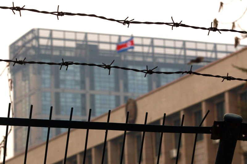 The North Korean flag flies over the North Korean embassy in Beijing. A U.N. group of experts are calling for a stronger response to North Korea human rights violations ahead of the 34th regular session of the U.N. Human Rights Council on Feb. 27. UPI/Stephen Shaver