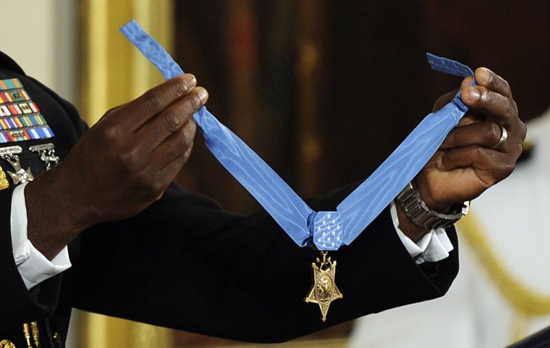 Dakota Meyer, a former active duty Marine Corps Corporal, received this Medal of Honor for his actions in battle in Afghanistan during a ceremony in the East Room of the White House in Washington, DC, on September 15, 2011. The U.S. Supreme Court is considering a challenge to a federal law making it a crime to claim unearned military honors. UPI/Roger L. Wollenberg | <a href="/News_Photos/lp/4d5510876b599d6ca6f2c9eb5d88df47/" target="_blank">License Photo</a>