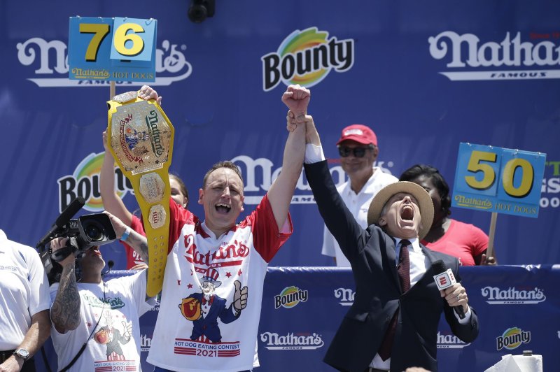 Joey Chestnut relishes Nathan's record 76 hot dogs in 10 minutes