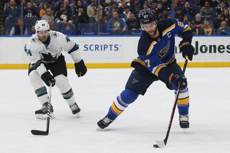 St. Louis Blues' Alex Pietrangelo tries to pass the puck in front of San Jose Sharks' Marc-Edouard Vlasic in 2017 at the Scottrade Center in St. Louis, Mo. File photo by Bill Greenblatt/UPI