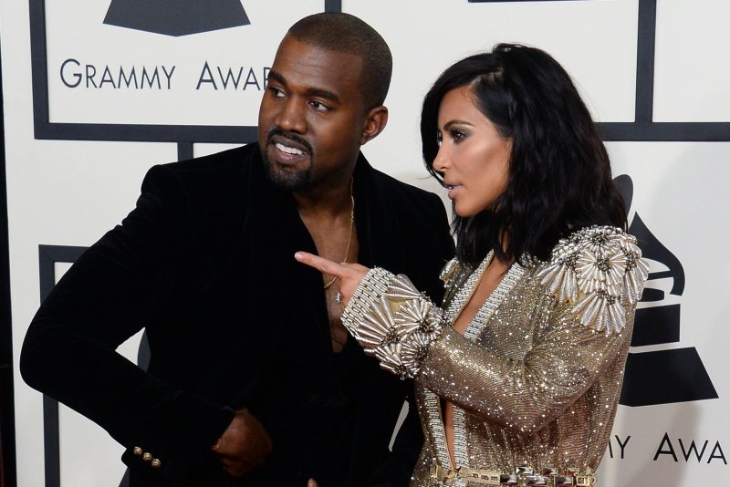Kim Kardashian, Kanye West sport blue contacts as 'Wolves'