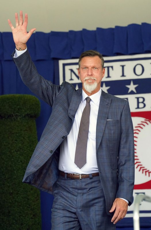 National Baseball Hall of Fame member Randy Johnson waves to the crowd in Cooperstown, N.Y., on July 23. The former pitcher turns 60 on September 10. File Photo by Bill Greenblatt/UPI