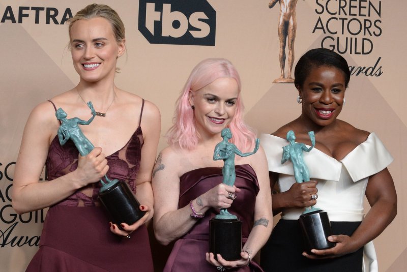"Orange is the New Black" stars, left to right, Taylor Schilling, Taryn Manning and Uzo Aduba. The stars announced in a video that Season 7 will conclude the series. File Photo by Jim Ruymen/UPI