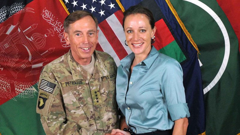 In an image from the International Security Assistance Force (ISAF), ISAF Commander General David Petraeus shakes hands with Paula Broadwell in July 2011. UPI/ISAF