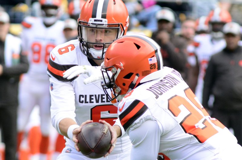 Cleveland Browns quarterback Baker Mayfield hands off the football to running back Duke Johnson during a game against the Pittsburgh Steelers at Heinz Field on October 28, 2018. Photo by Archie Carpenter/UPI
