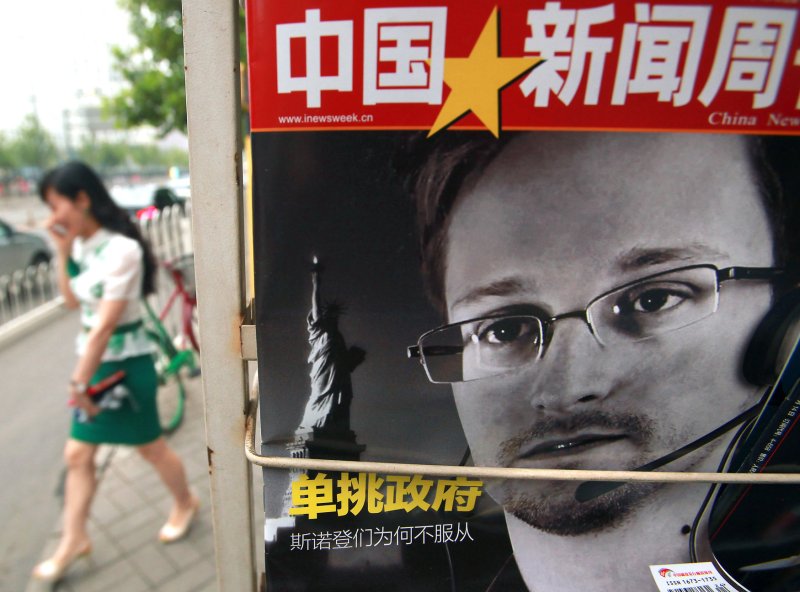 China's version of Newsweek magazine featuring a front-page story on American intelligence leaker Edward Snowden is sold at a news stand in Beijing on July 8, 2013. The White House issued a blistering criticism of China over its decision to let Snowden leave Hong Kong for Russia, saying by doing so it hurt U.S.-Sino relations. -- UPI/Stephen Shaver