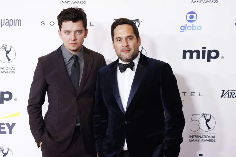 Asa Butterfield (L) returns as James Hughes in the new film "Your Christmas or Mine 2." File Photo by John Angelillo/UPI