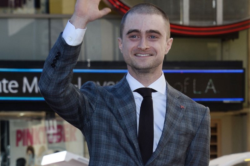 "Privacy" actor Daniel Radcliffe waves during an unveiling ceremony honoring him with the 2,565th star on the Hollywood Walk of Fame on November 12, 2015. File photo by Jim Ruymen/UPI