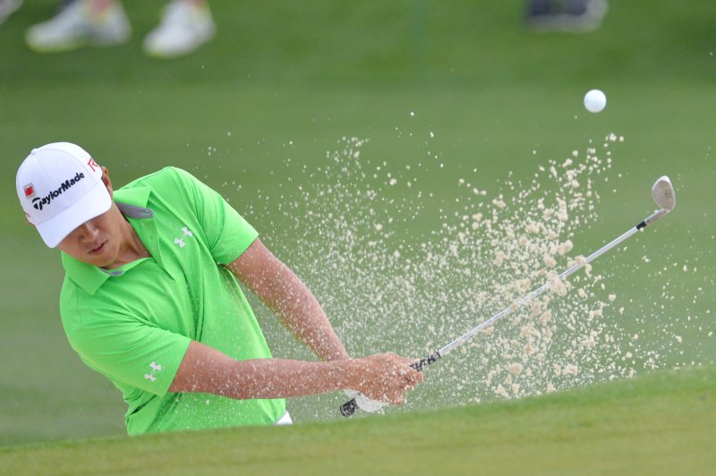 James Hahn hits out of a bunker on the 2nd hole in the second round of the 2015 Masters Tournament. File photo by Kevin Dietsch/UPI | <a href="/News_Photos/lp/72b49adf79913c9af34262744f1de321/" target="_blank">License Photo</a>