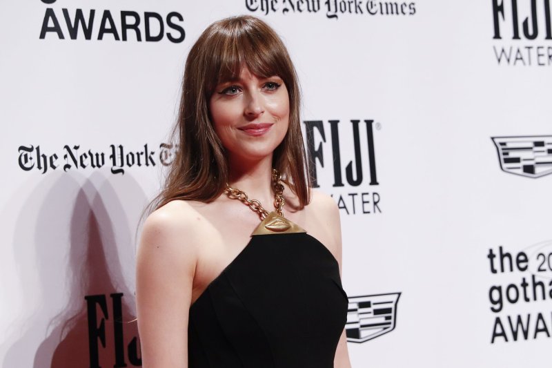 Dakota Johnson discussed the challenges of filming the "Fifty Shades" movies, including her issues with author E.L. James. File Photo by John Angelillo/UPI